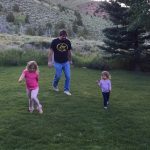 Bill Busbice playing with Emma and Ella